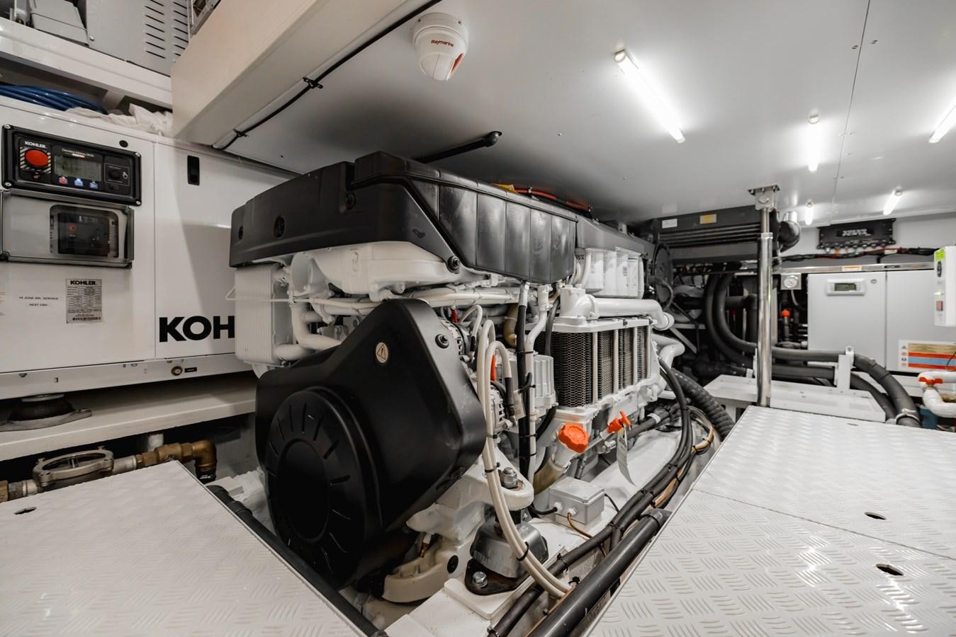 a large machine in a room aboard RADKAT Yacht for Sale