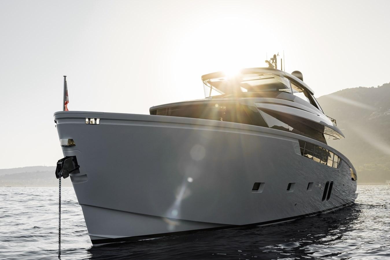 a white boat on the water aboard RADKAT Yacht for Sale
