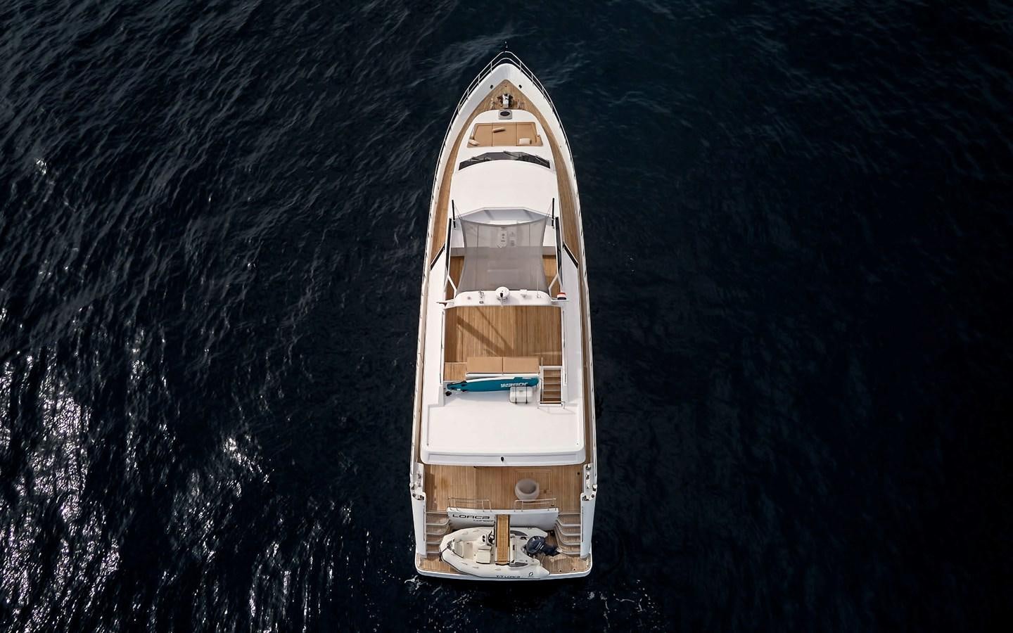a gold and silver boat aboard LORCA Yacht for Sale