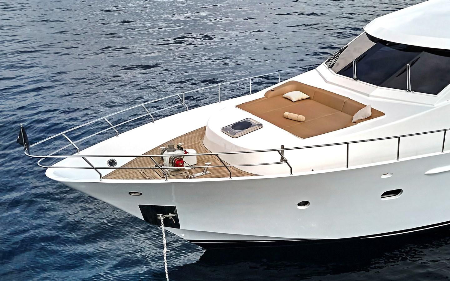 a white yacht on the water aboard LORCA Yacht for Sale