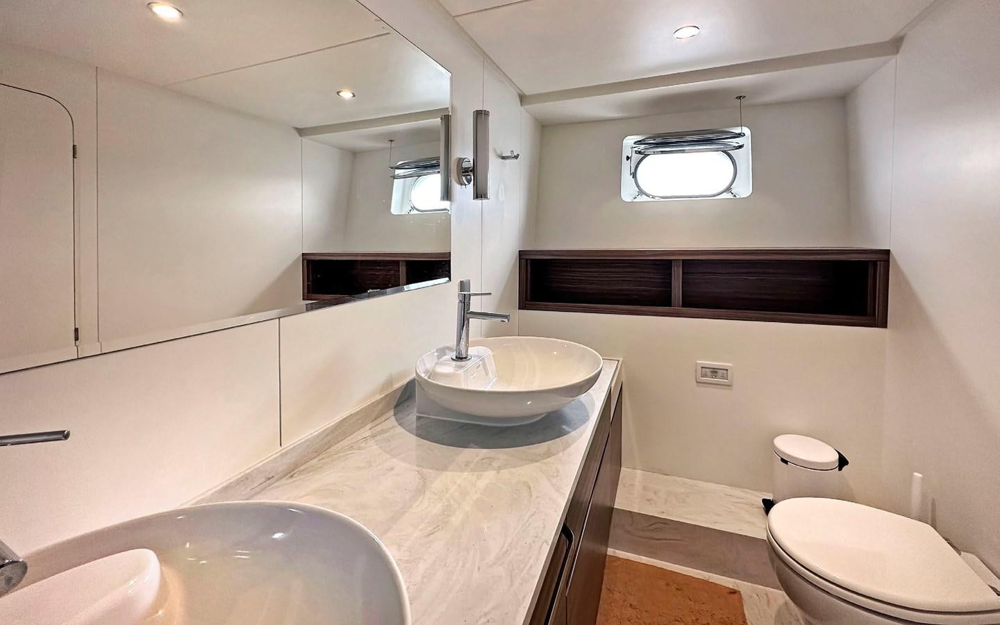 a bathroom with a sink and a toilet aboard LORCA Yacht for Sale