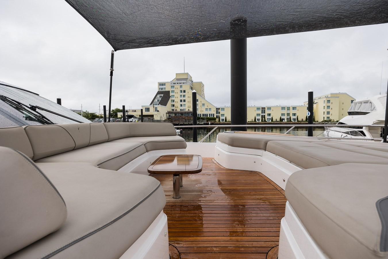 a room with couches and a table and a building aboard SPINDRIFT Yacht for Sale