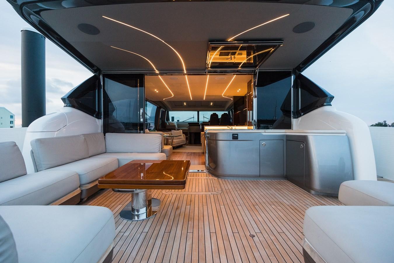 a room with a table and chairs aboard SPINDRIFT Yacht for Sale