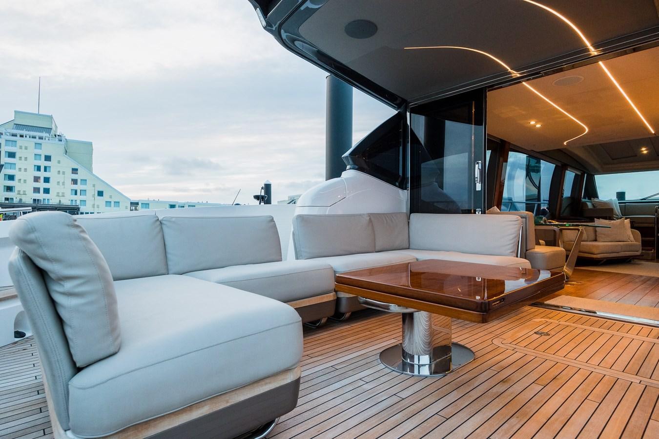 a room with a couch and a table aboard SPINDRIFT Yacht for Sale