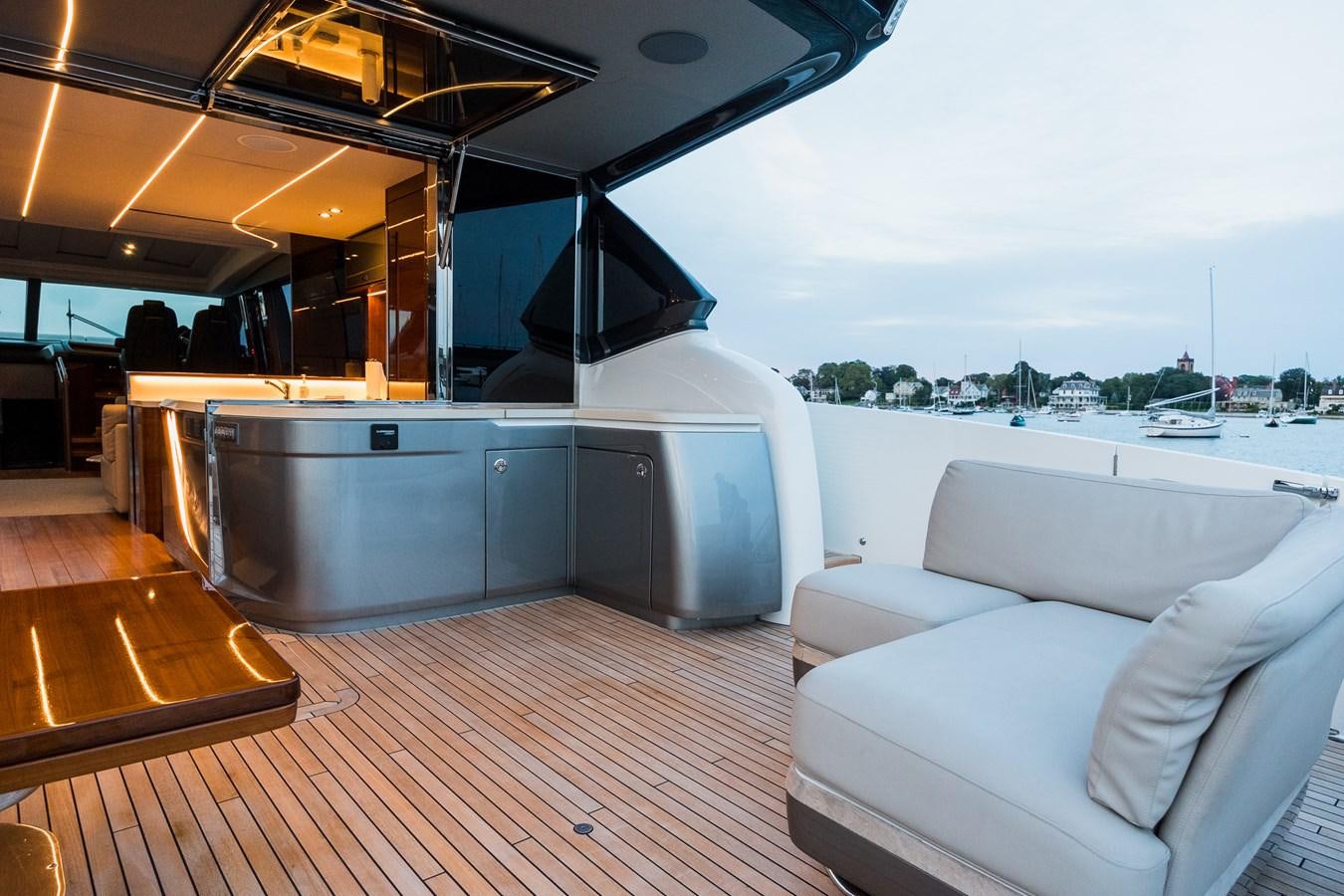 a room with a couch and a table aboard SPINDRIFT Yacht for Sale
