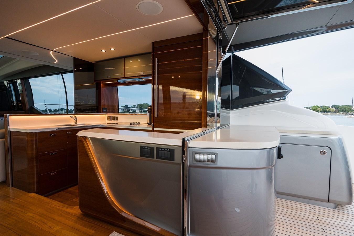 a kitchen with a large window aboard SPINDRIFT Yacht for Sale