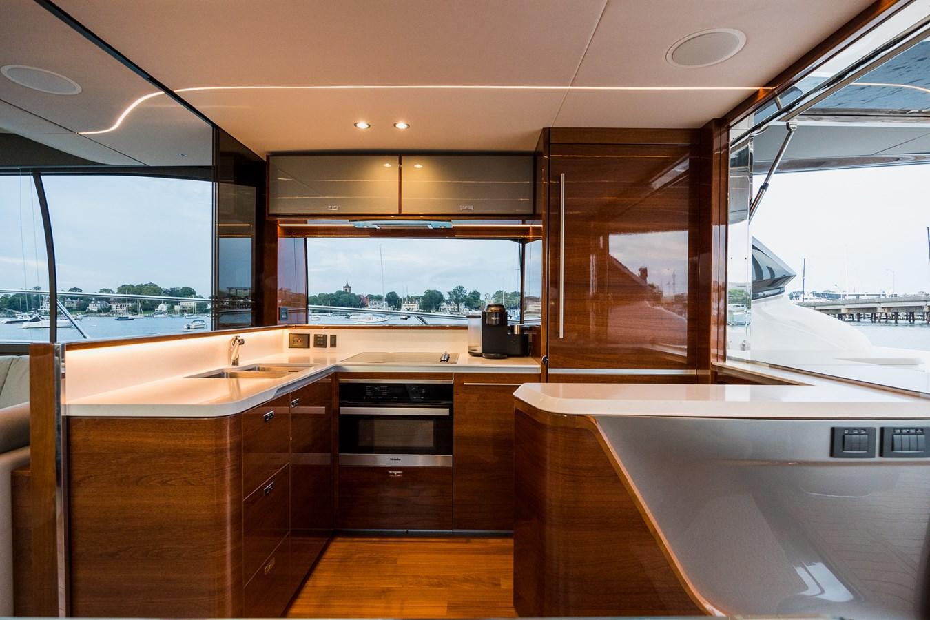 a kitchen with a large window aboard SPINDRIFT Yacht for Sale