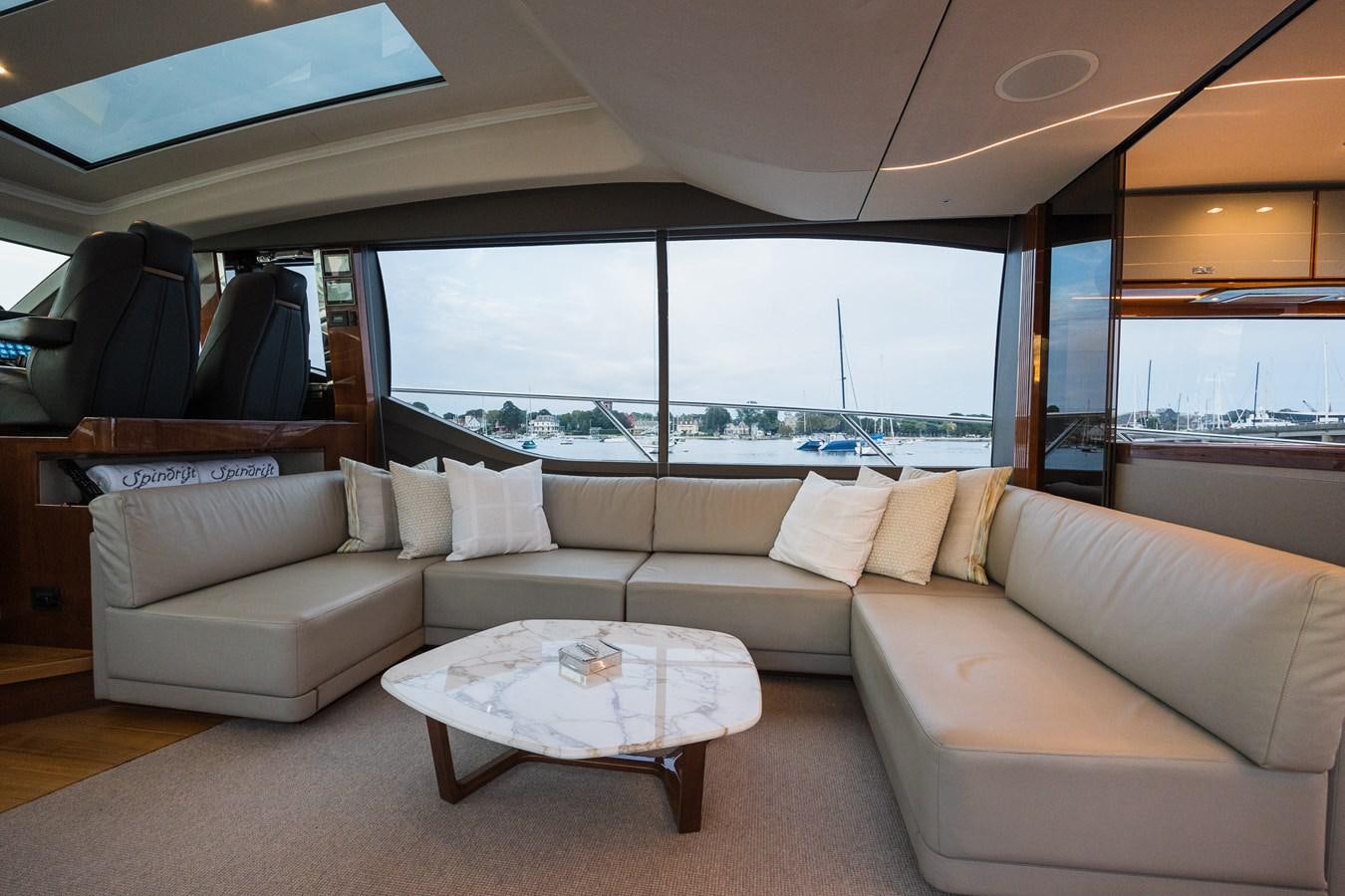 a living room with a large window aboard SPINDRIFT Yacht for Sale
