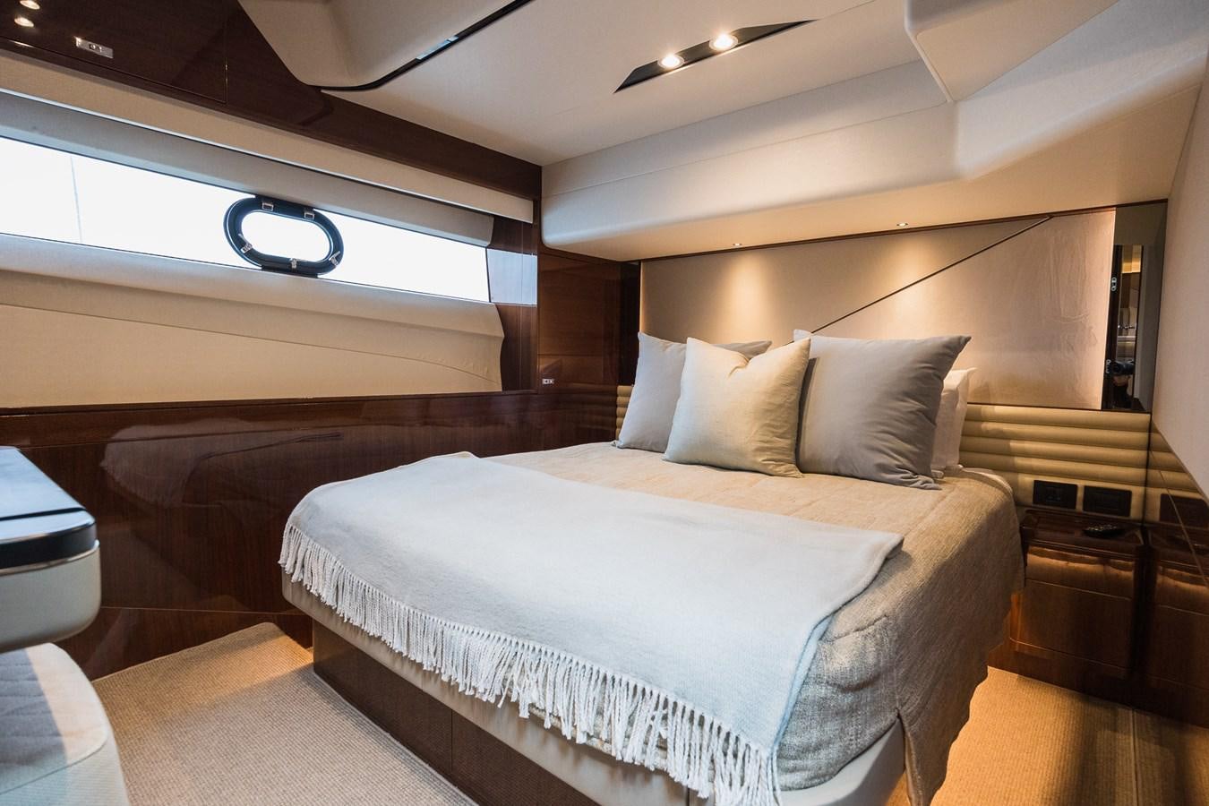 a room with a bed and a window aboard SPINDRIFT Yacht for Sale