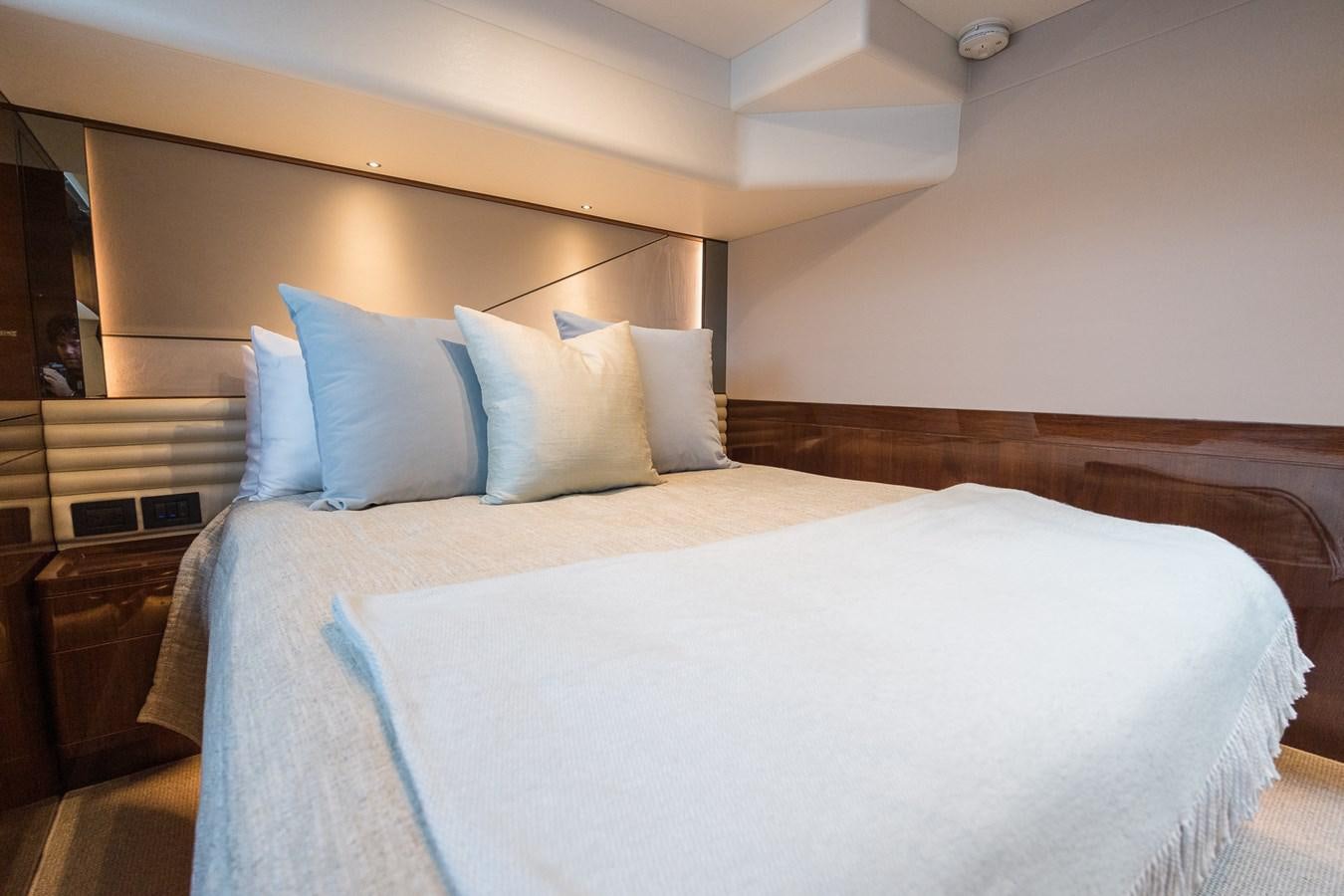 a bed with white sheets aboard SPINDRIFT Yacht for Sale