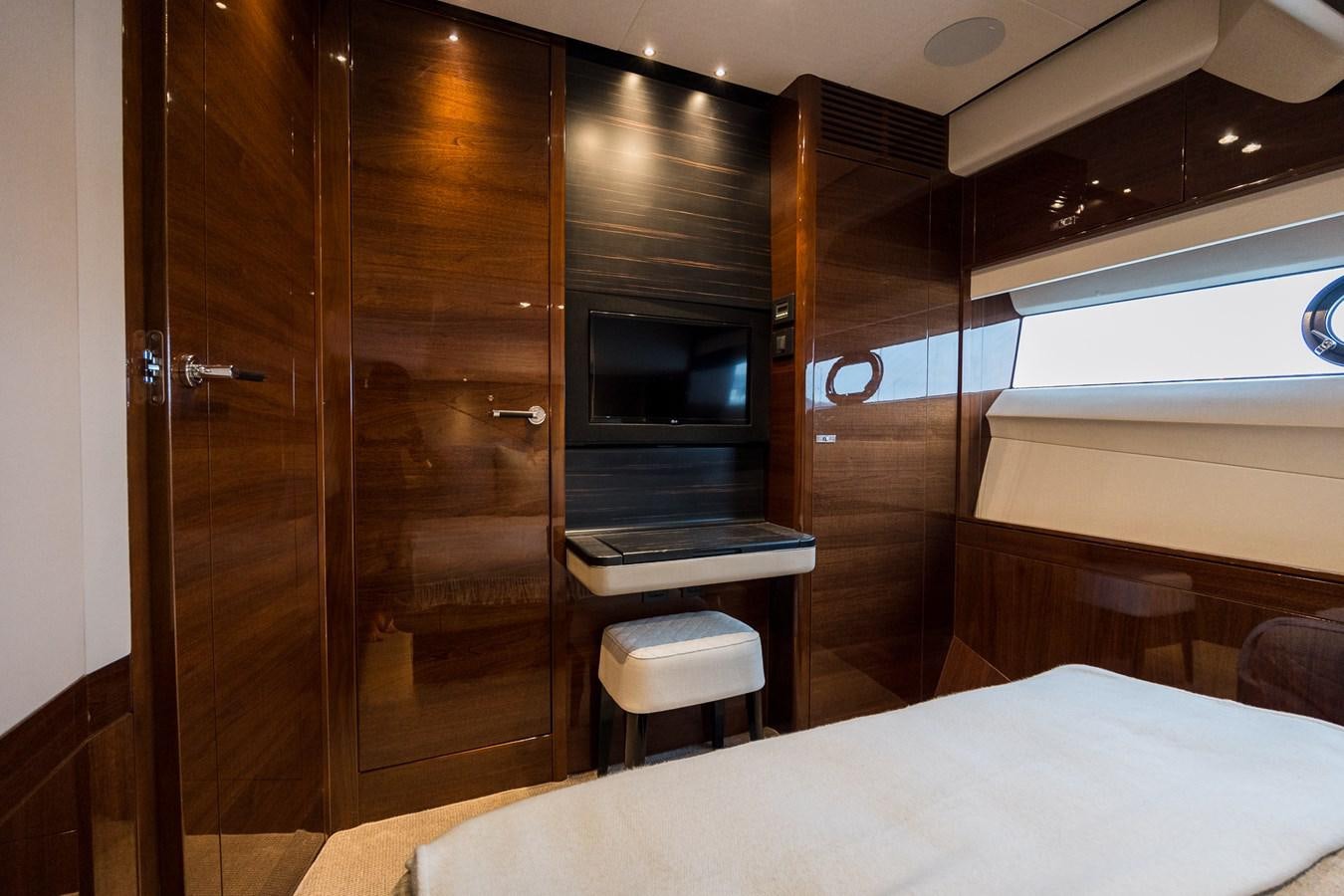a room with a bed and a tv aboard SPINDRIFT Yacht for Sale