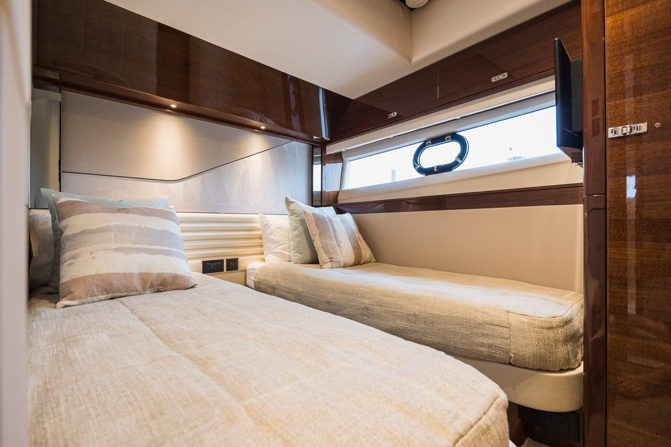 a bed with a white sheet aboard SPINDRIFT Yacht for Sale