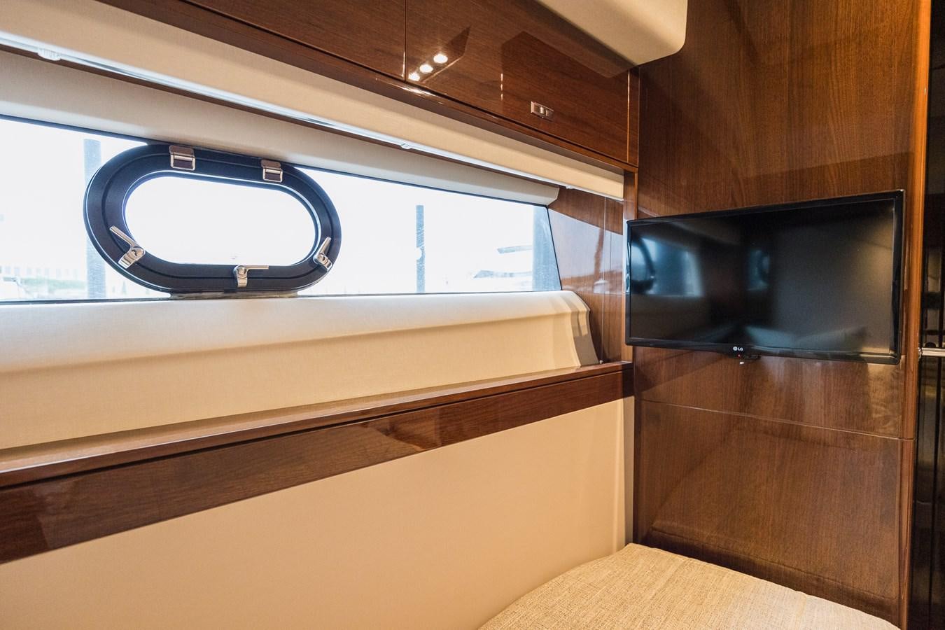a room with a window and a television aboard SPINDRIFT Yacht for Sale