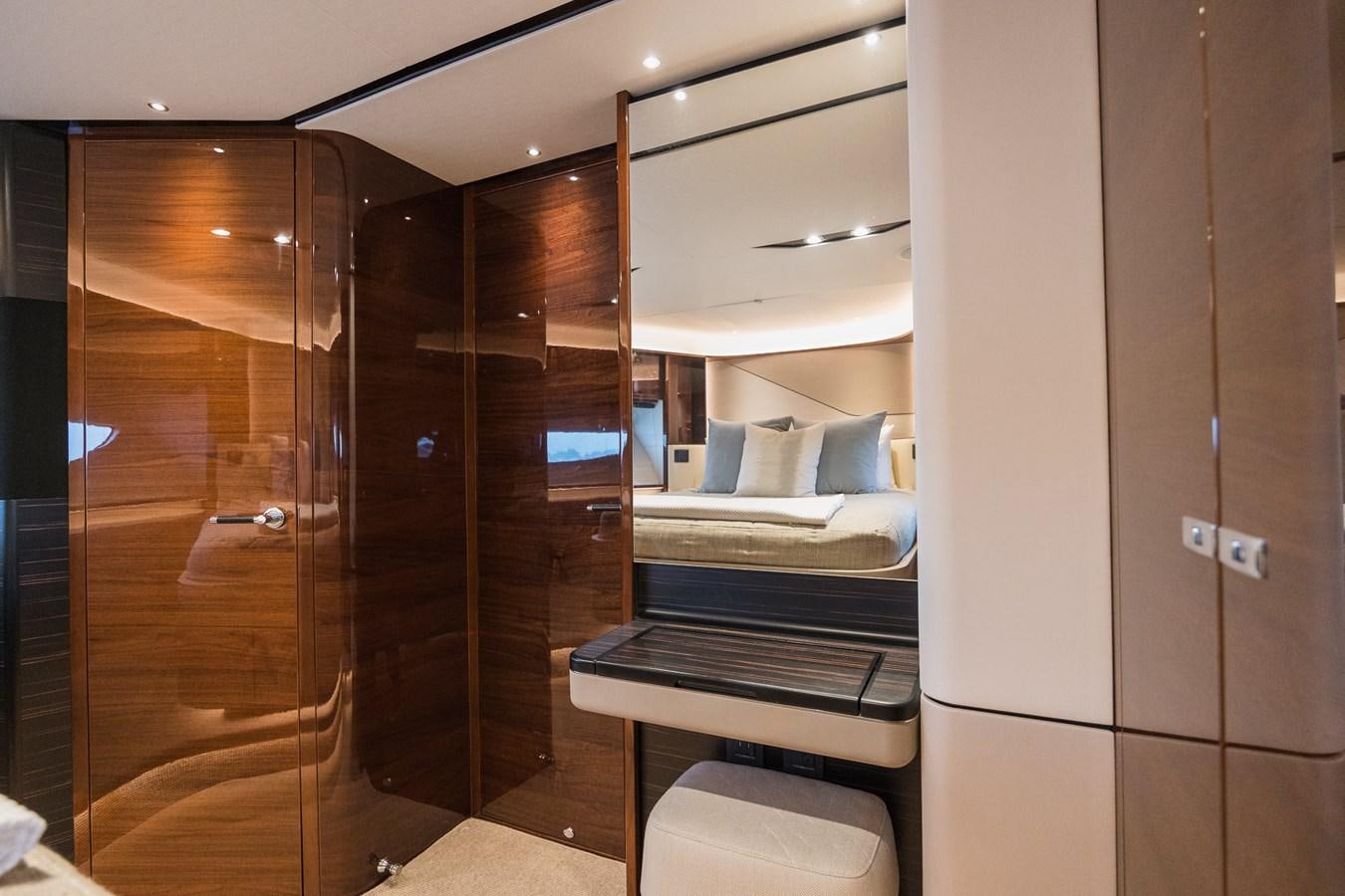 a room with a bed and a closet aboard SPINDRIFT Yacht for Sale
