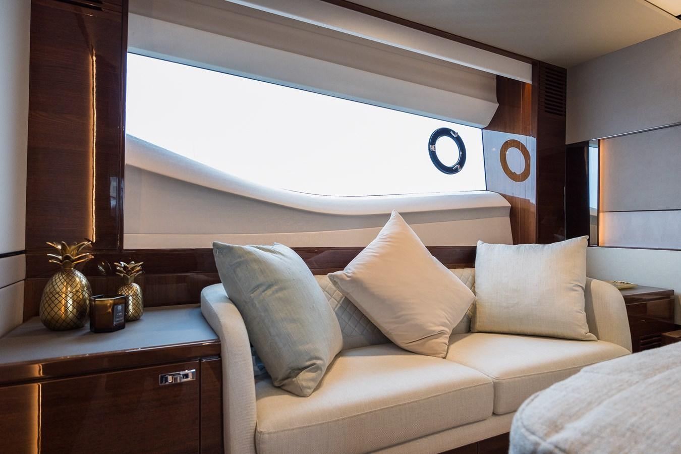 a white couch with pillows aboard SPINDRIFT Yacht for Sale