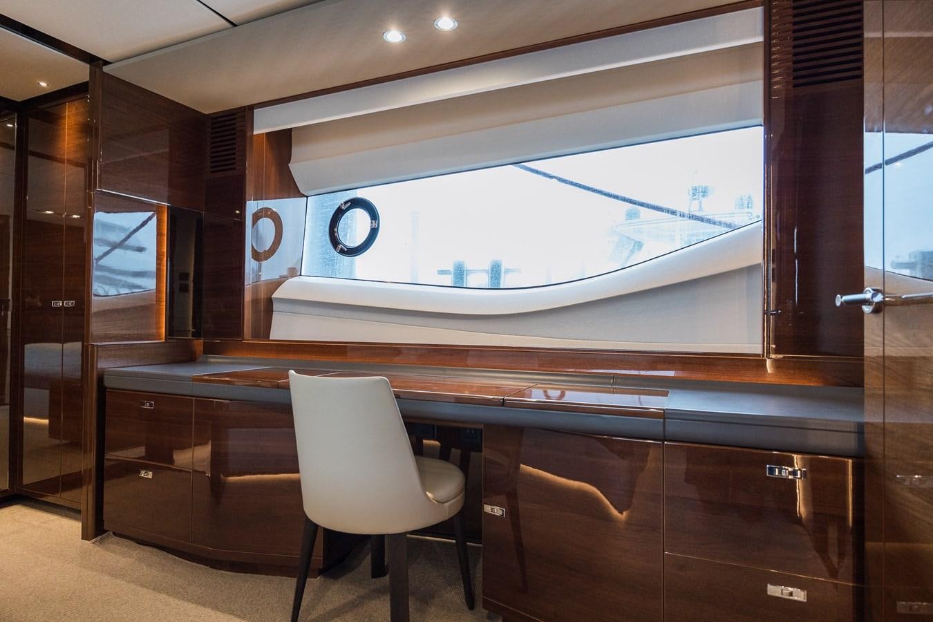 a room with a table and chairs aboard SPINDRIFT Yacht for Sale