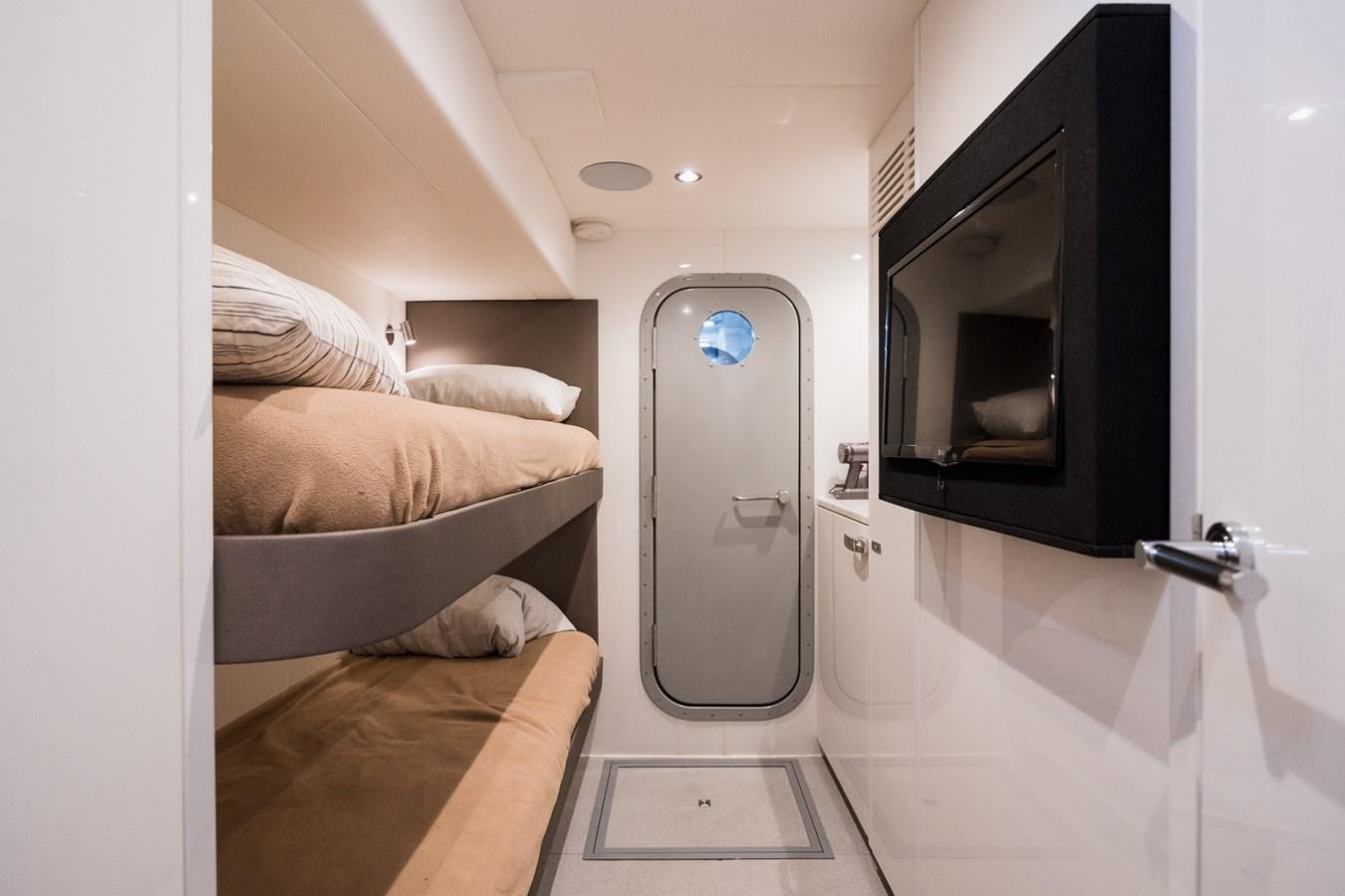 a room with a bed and a mirror aboard SPINDRIFT Yacht for Sale