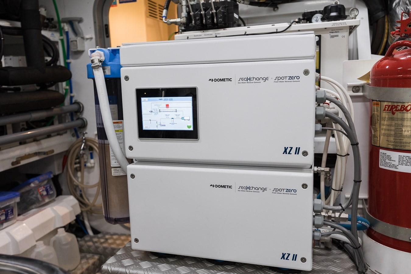 a white machine with a screen aboard SPINDRIFT Yacht for Sale