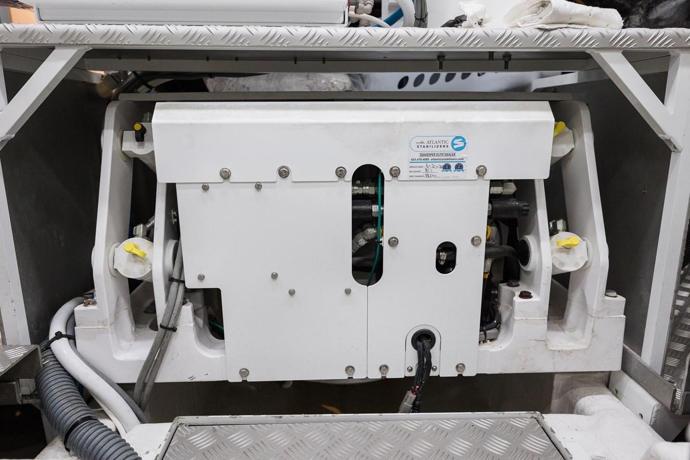 a white machine with a black handle aboard SPINDRIFT Yacht for Sale