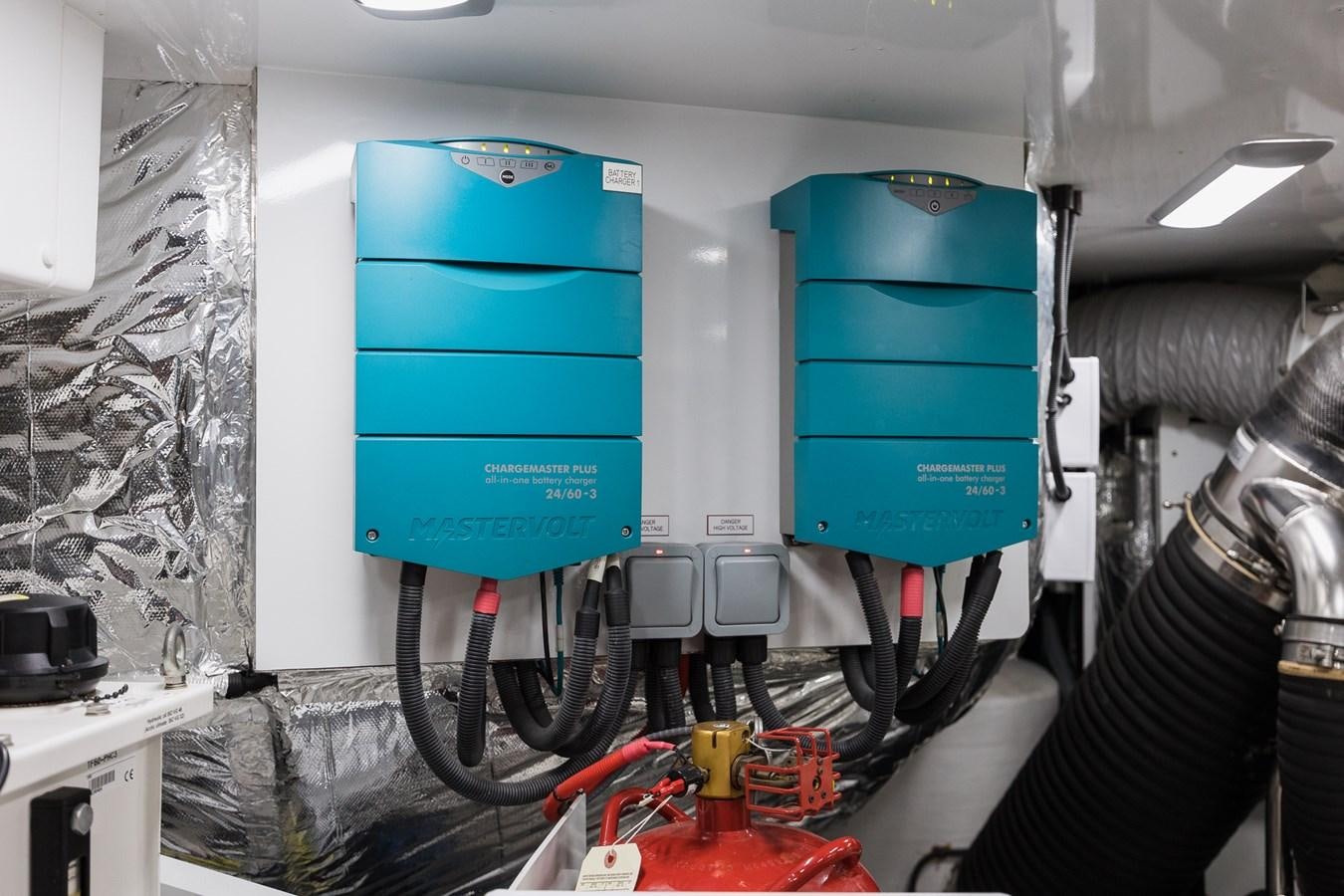 a room with a large blue container aboard SPINDRIFT Yacht for Sale