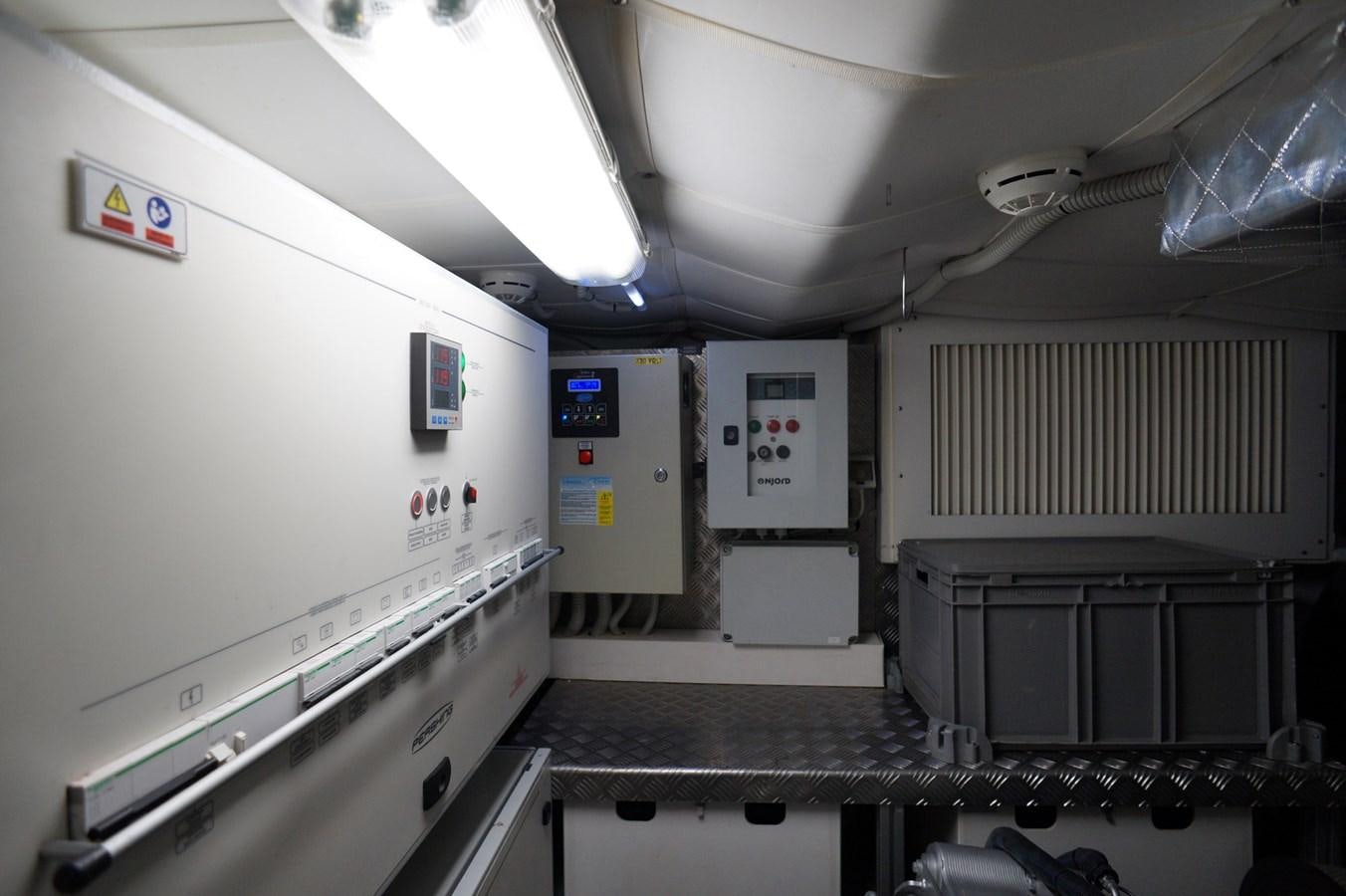 a room with machines aboard THE OFFICE Yacht for Sale