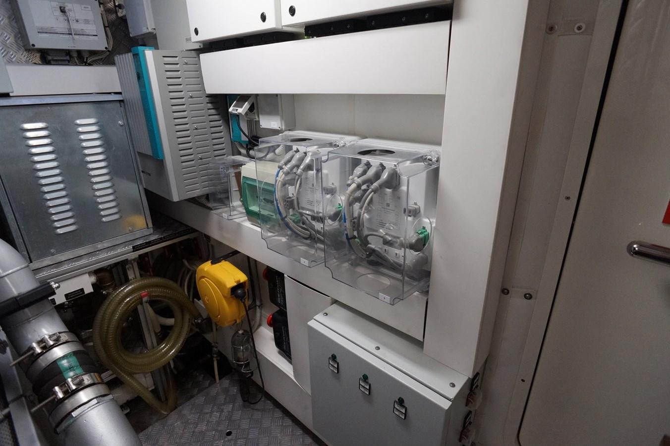 a machine with a large glass case aboard THE OFFICE Yacht for Sale