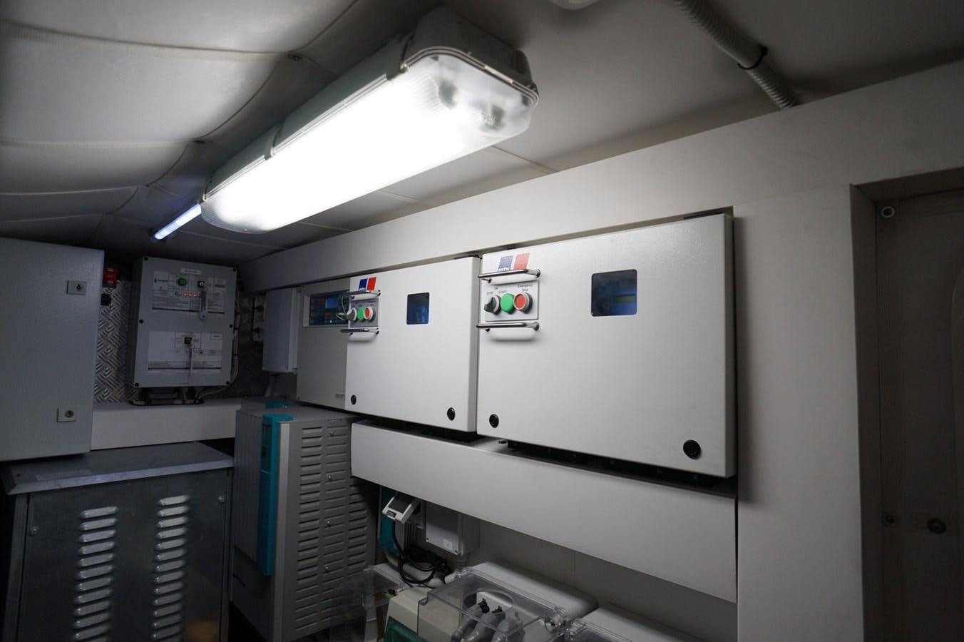 a room with several machines aboard THE OFFICE Yacht for Sale