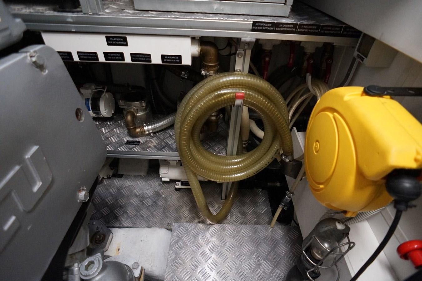a machine with a yellow wheel aboard THE OFFICE Yacht for Sale