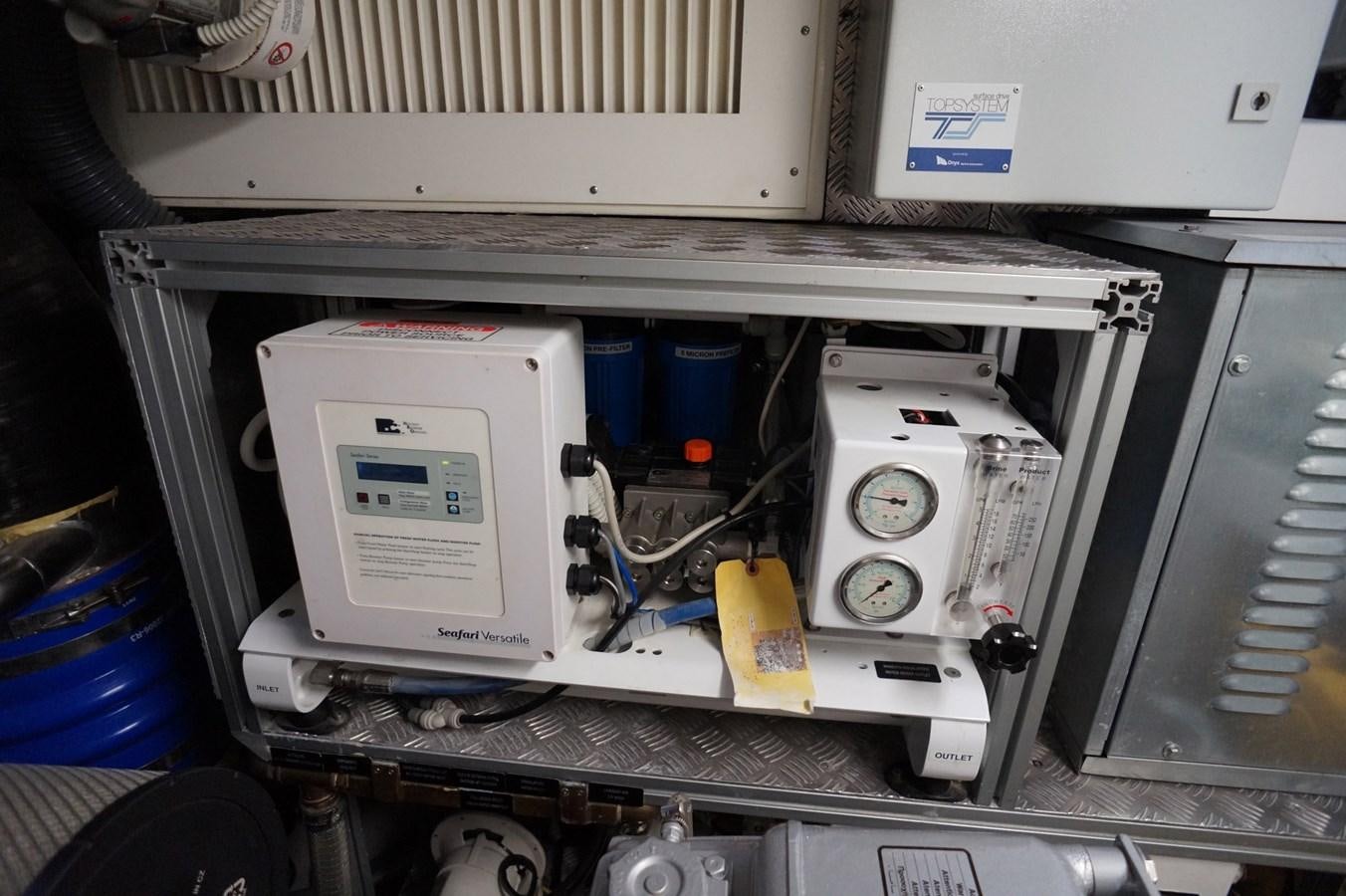 a machine with wires and a white box aboard THE OFFICE Yacht for Sale