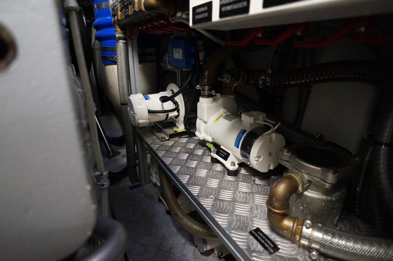 a car engine with a few parts aboard THE OFFICE Yacht for Sale