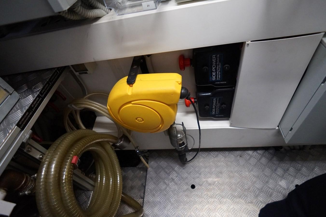 a yellow and black machine aboard THE OFFICE Yacht for Sale