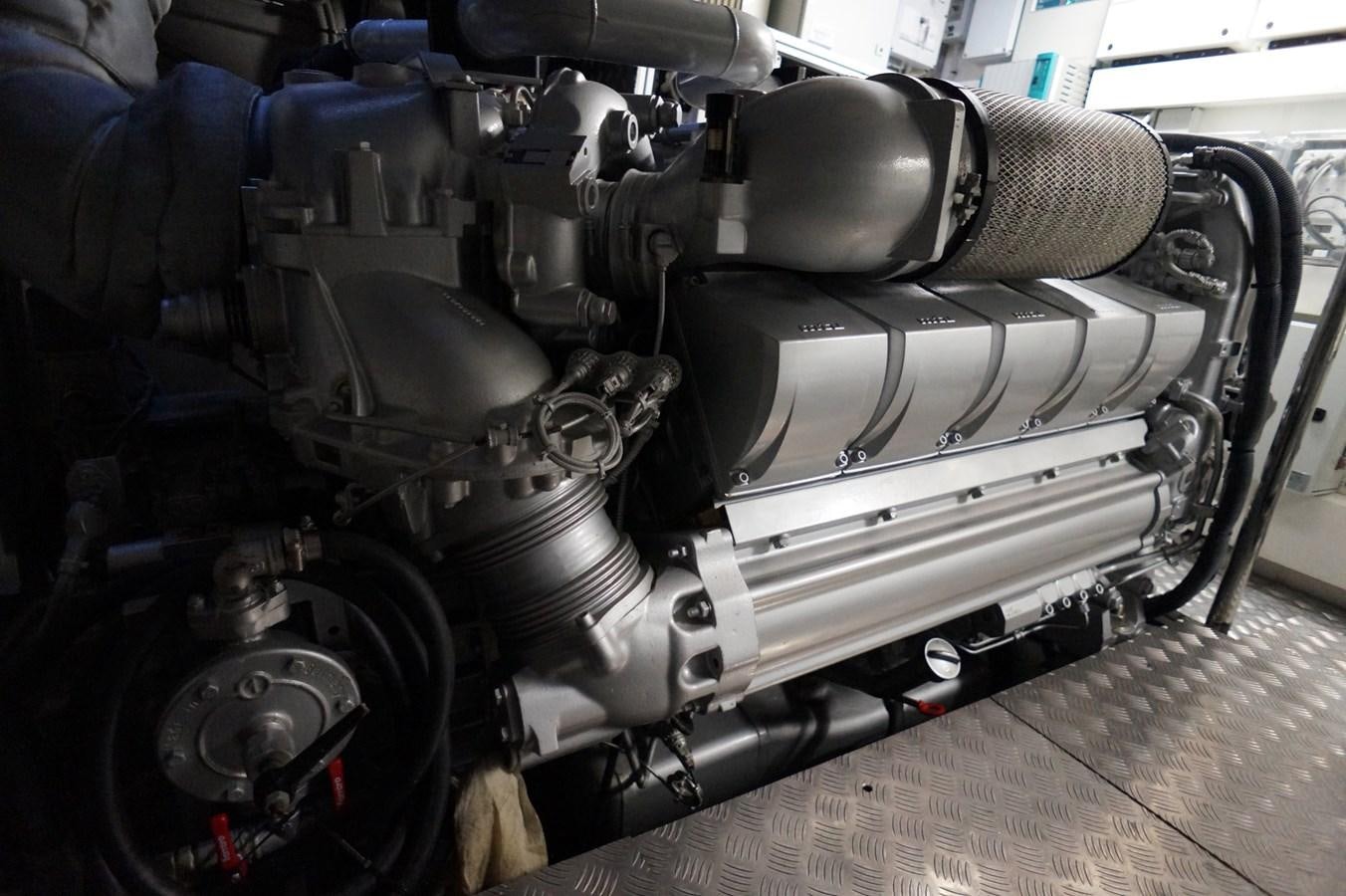 a car with a large engine aboard THE OFFICE Yacht for Sale