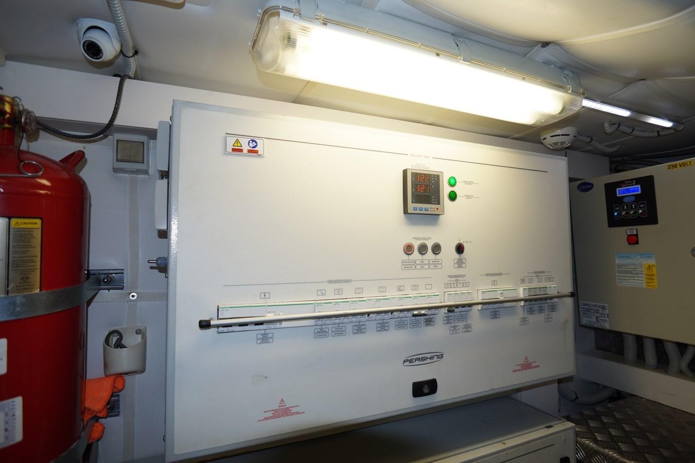 a white machine with buttons aboard THE OFFICE Yacht for Sale