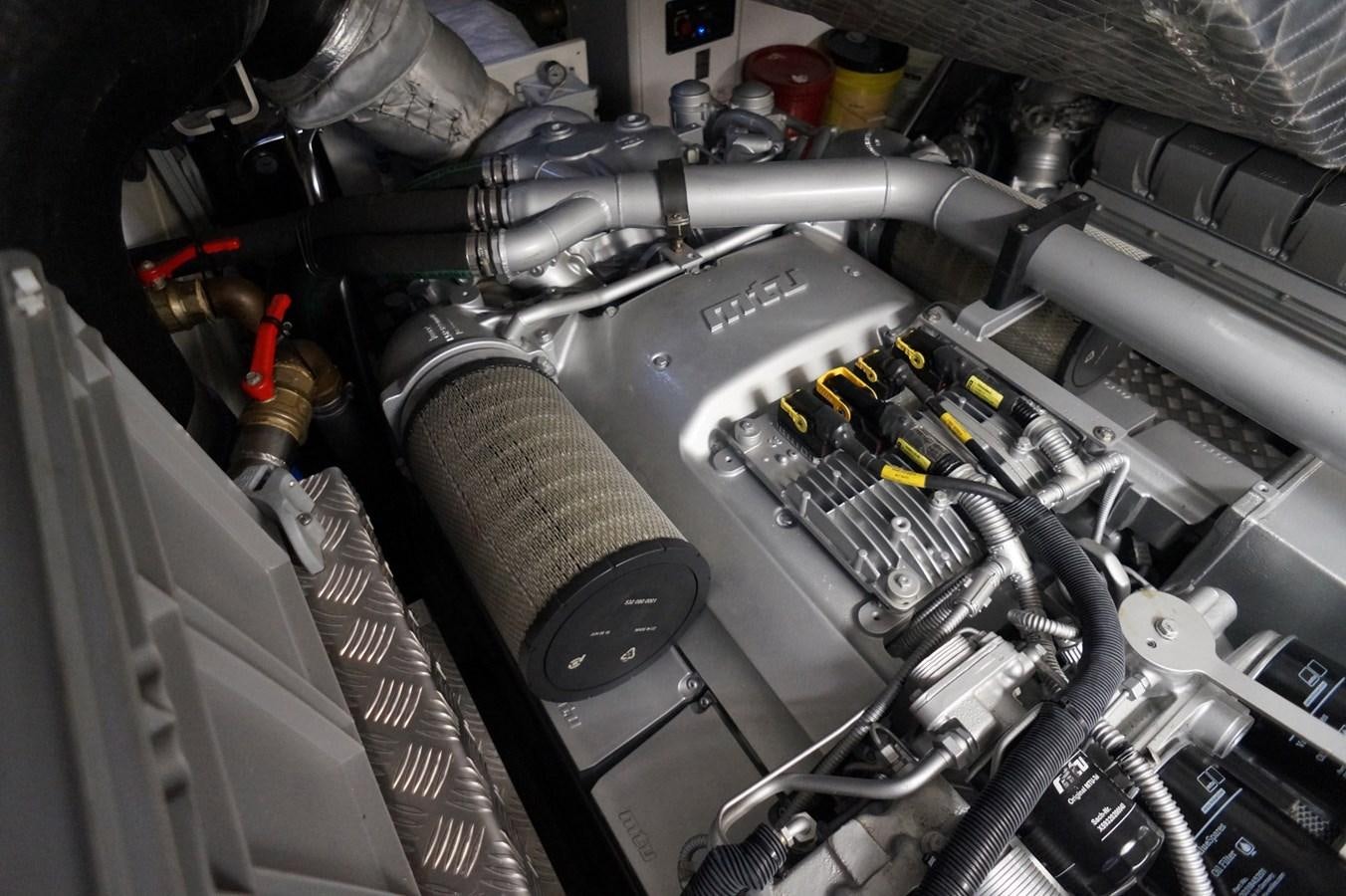 a machine with a large metal pipe aboard THE OFFICE Yacht for Sale