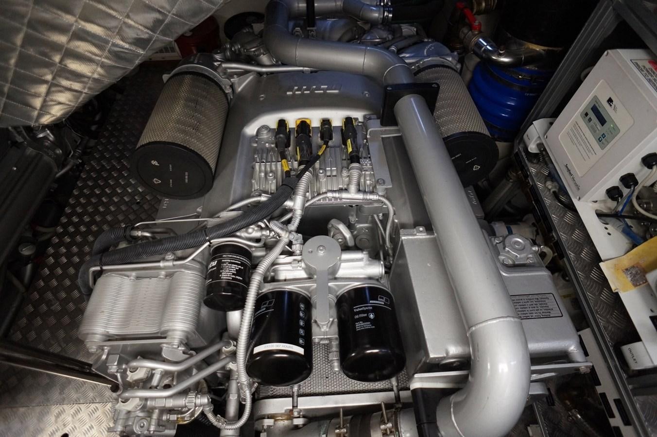 a close-up of a car engine aboard THE OFFICE Yacht for Sale