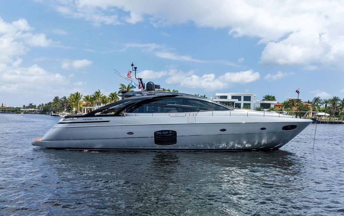 a white yacht on the water aboard LIQUID Yacht for Sale