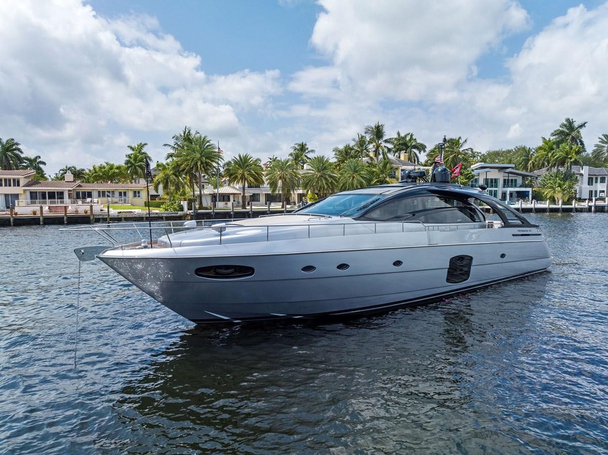 a white yacht in the water aboard LIQUID Yacht for Sale