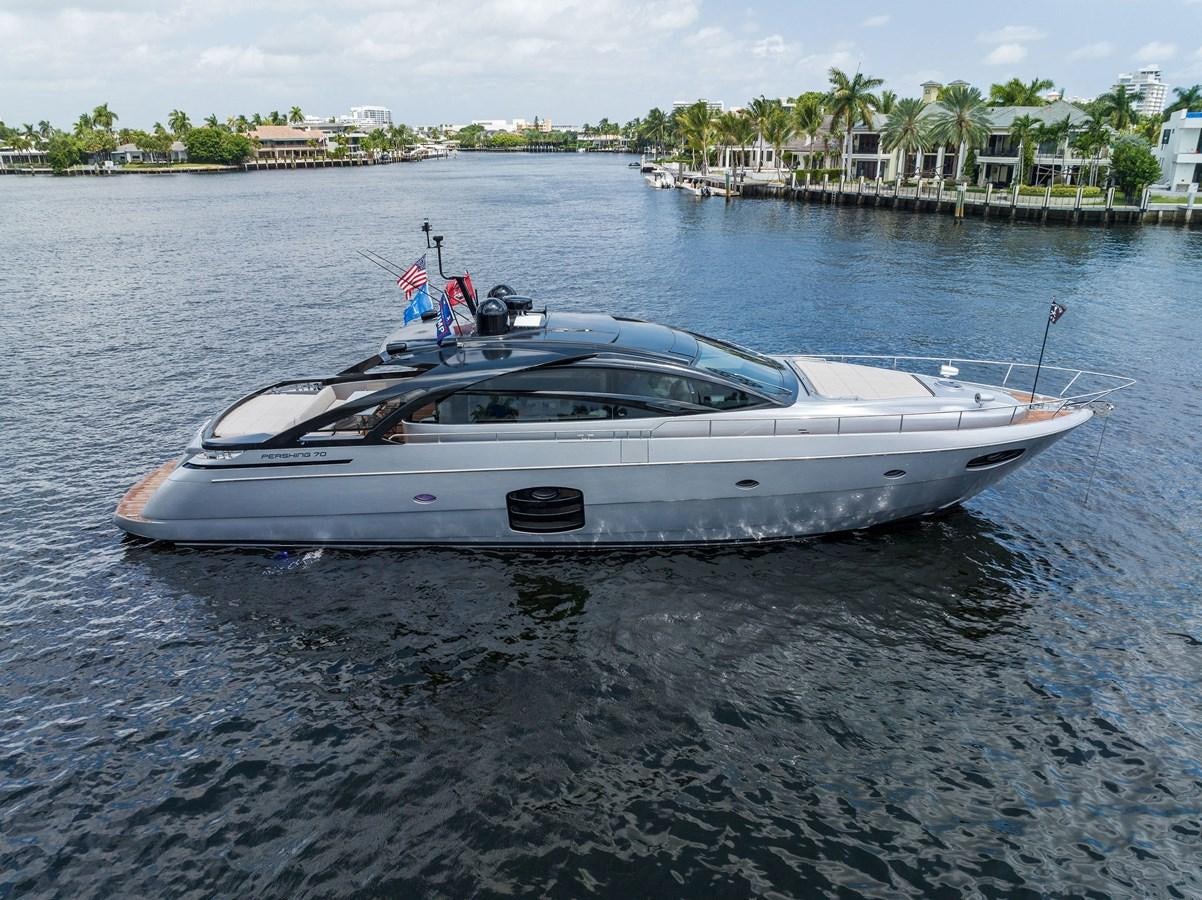 a white yacht in the water aboard LIQUID Yacht for Sale