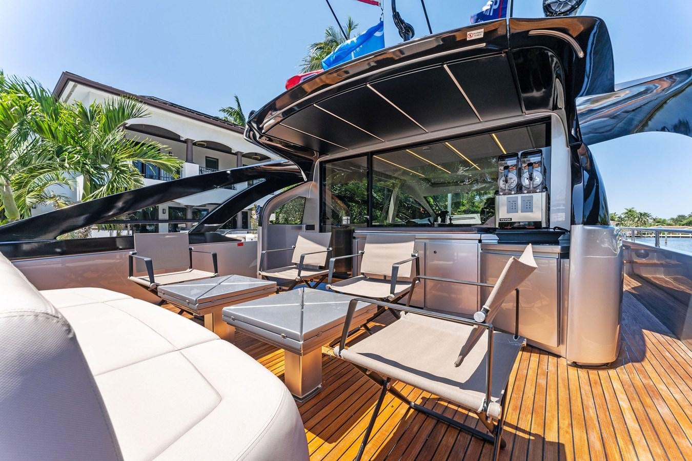 a boat on a deck aboard LIQUID Yacht for Sale