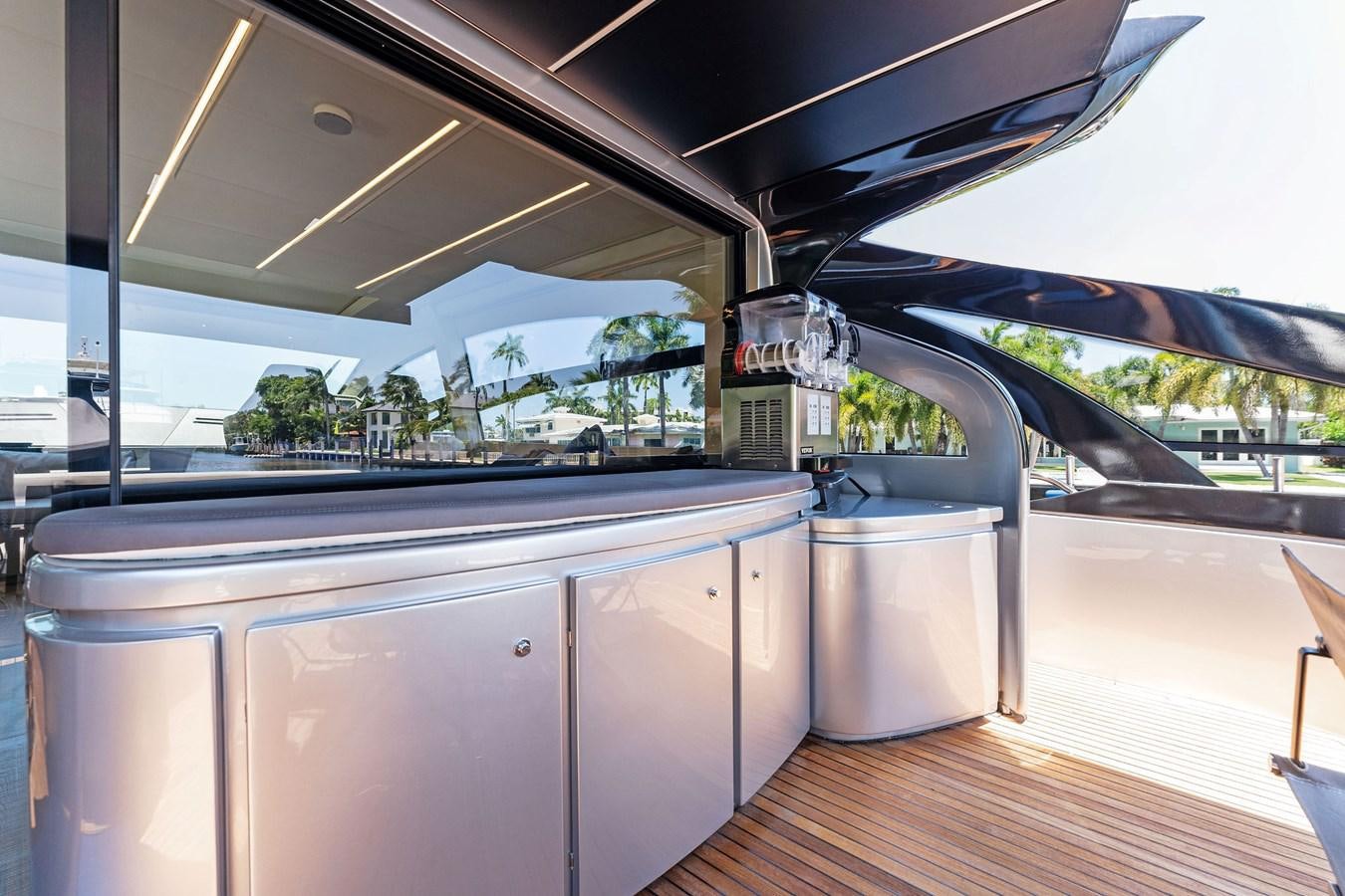 a car on a road aboard LIQUID Yacht for Sale