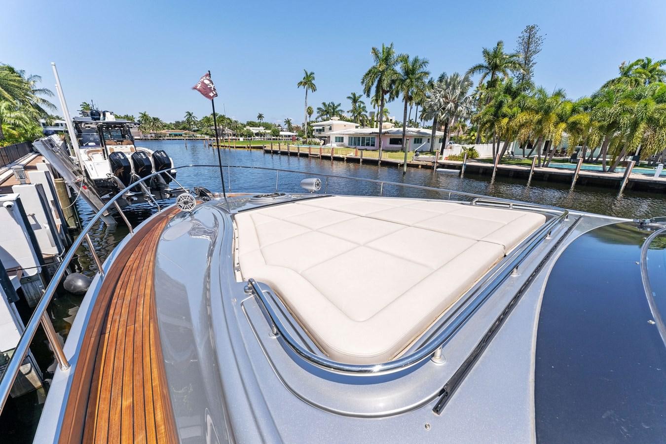 a boat in a harbor aboard LIQUID Yacht for Sale
