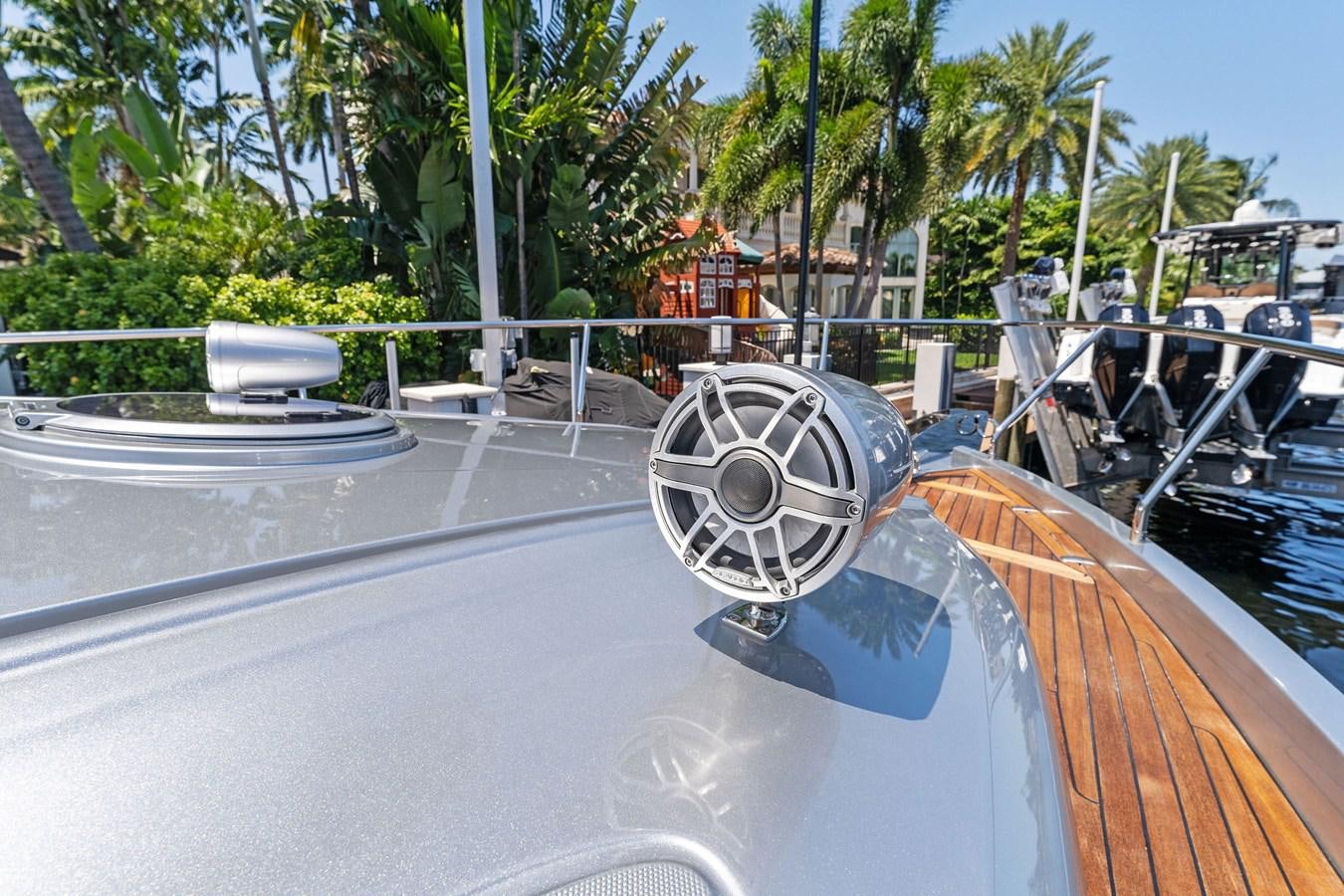 a water fountain with a round metal object in the middle aboard LIQUID Yacht for Sale