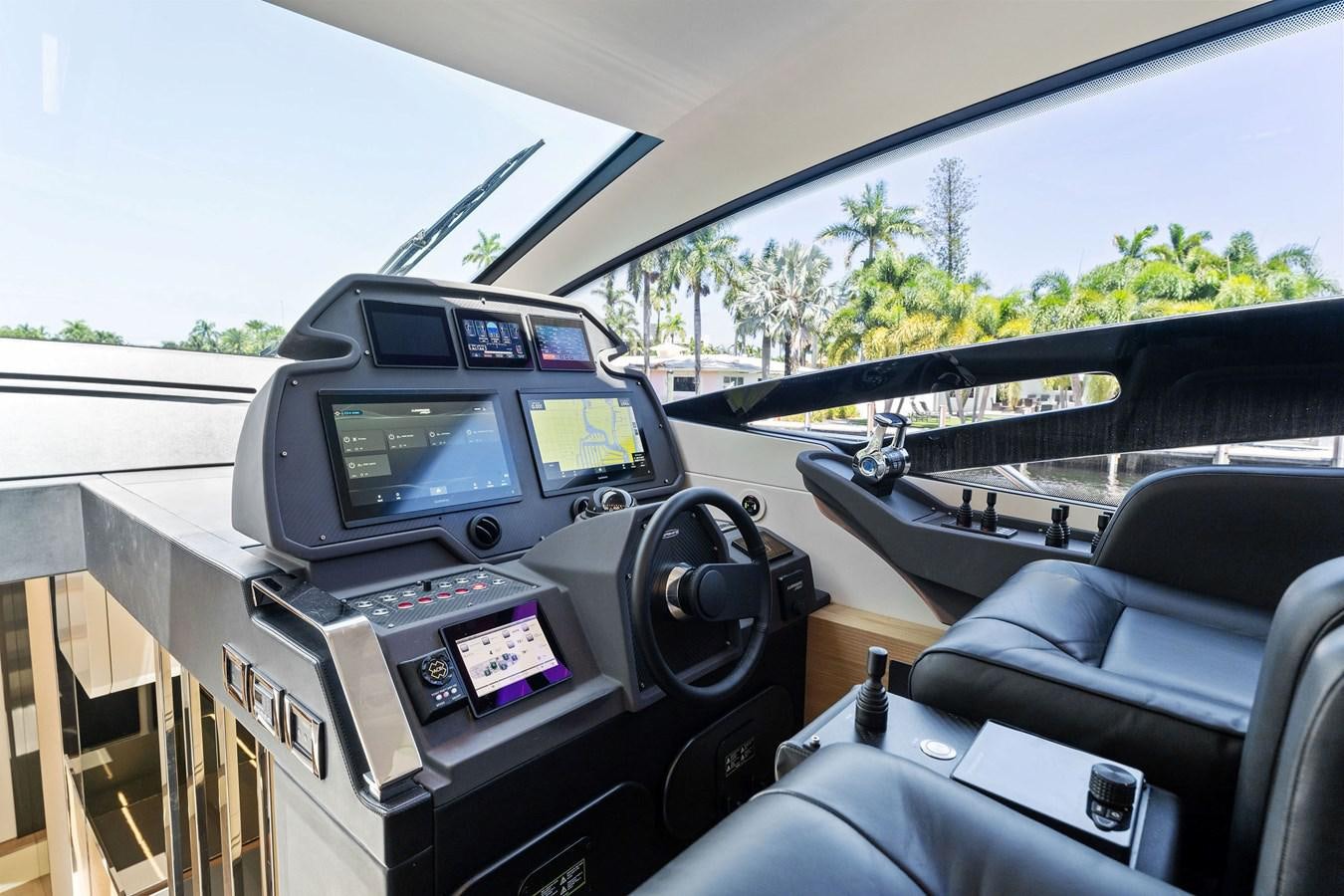the inside of a car aboard LIQUID Yacht for Sale