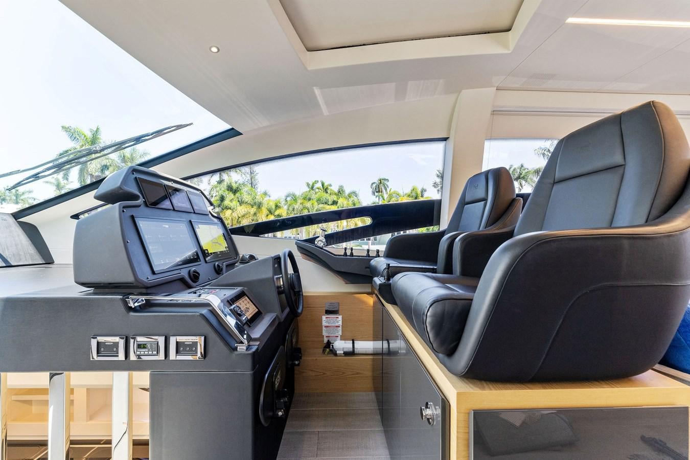 inside of a car aboard LIQUID Yacht for Sale