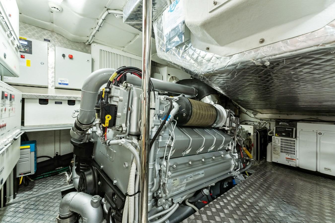 a machine in a factory aboard LIQUID Yacht for Sale