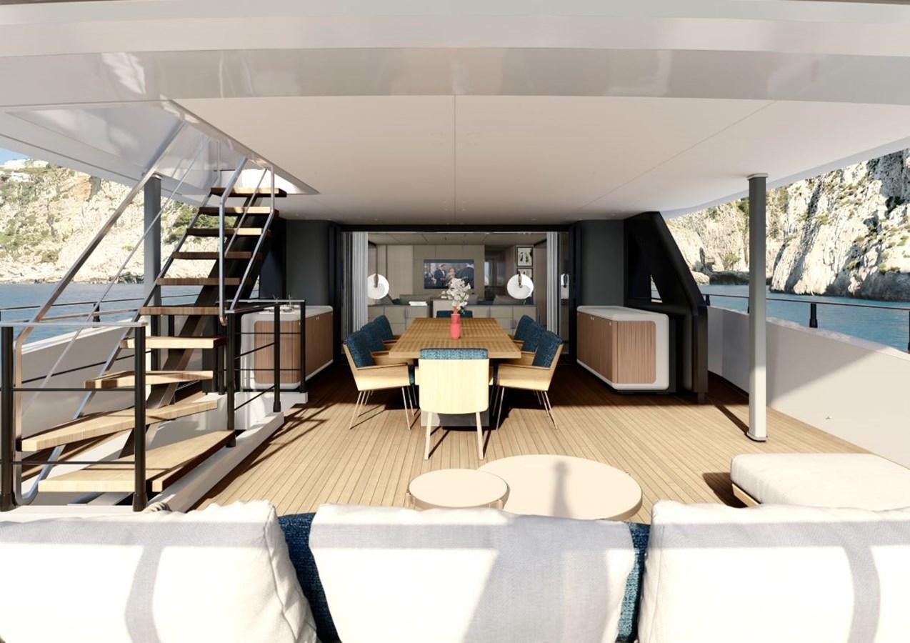 a room with a table and chairs aboard AMARE Yacht for Sale