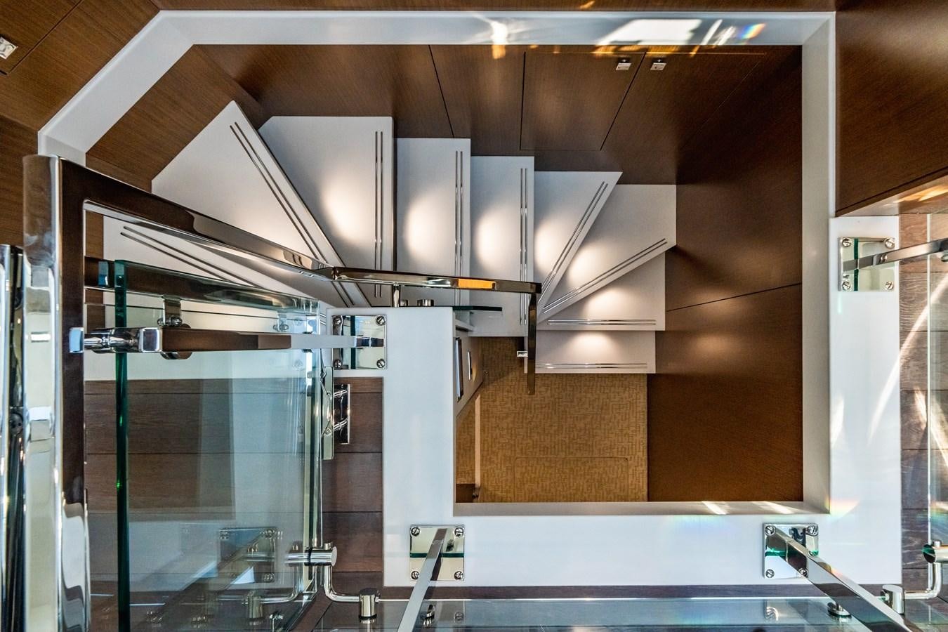 a room with a few large white cabinets and a large glass window aboard 2017 HATTERAS M75 K SEA Yacht for Sale