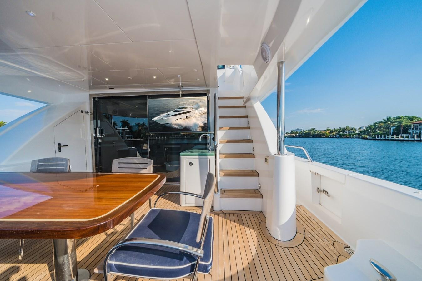 a boat on the water aboard 2017 HATTERAS M75 K SEA Yacht for Sale