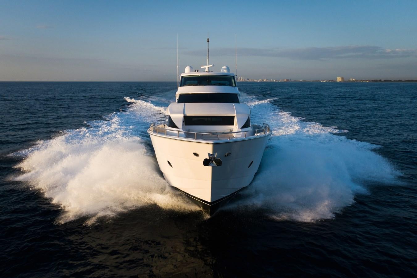 a boat on the water aboard 2017 HATTERAS M75 K SEA Yacht for Sale