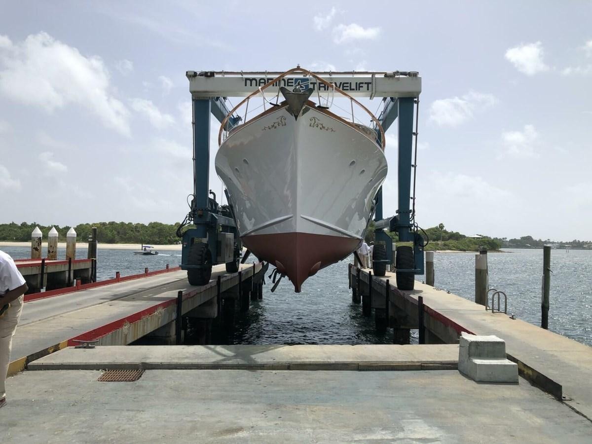 a large white container on a dock aboard DOVETAIL Yacht for Sale